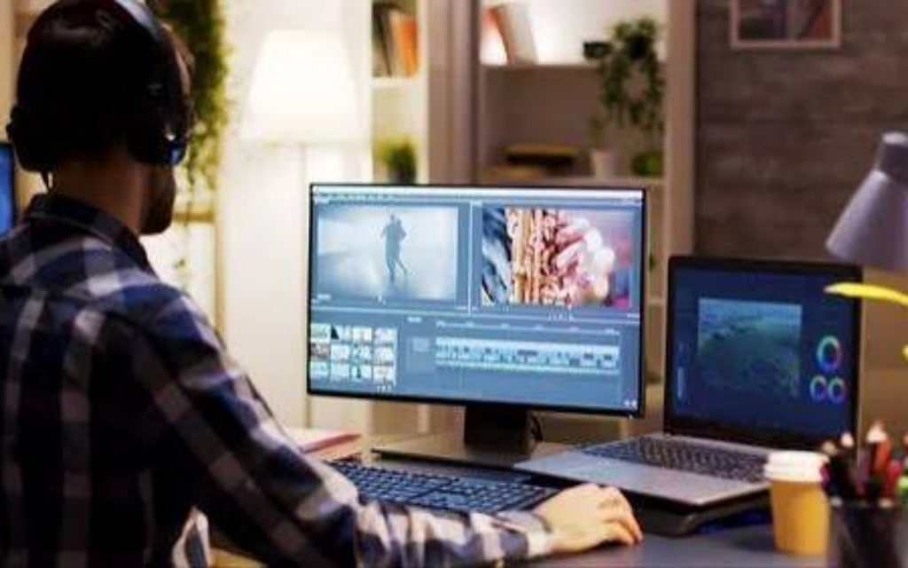 Video editing software with branded visuals and motion graphics on laptop